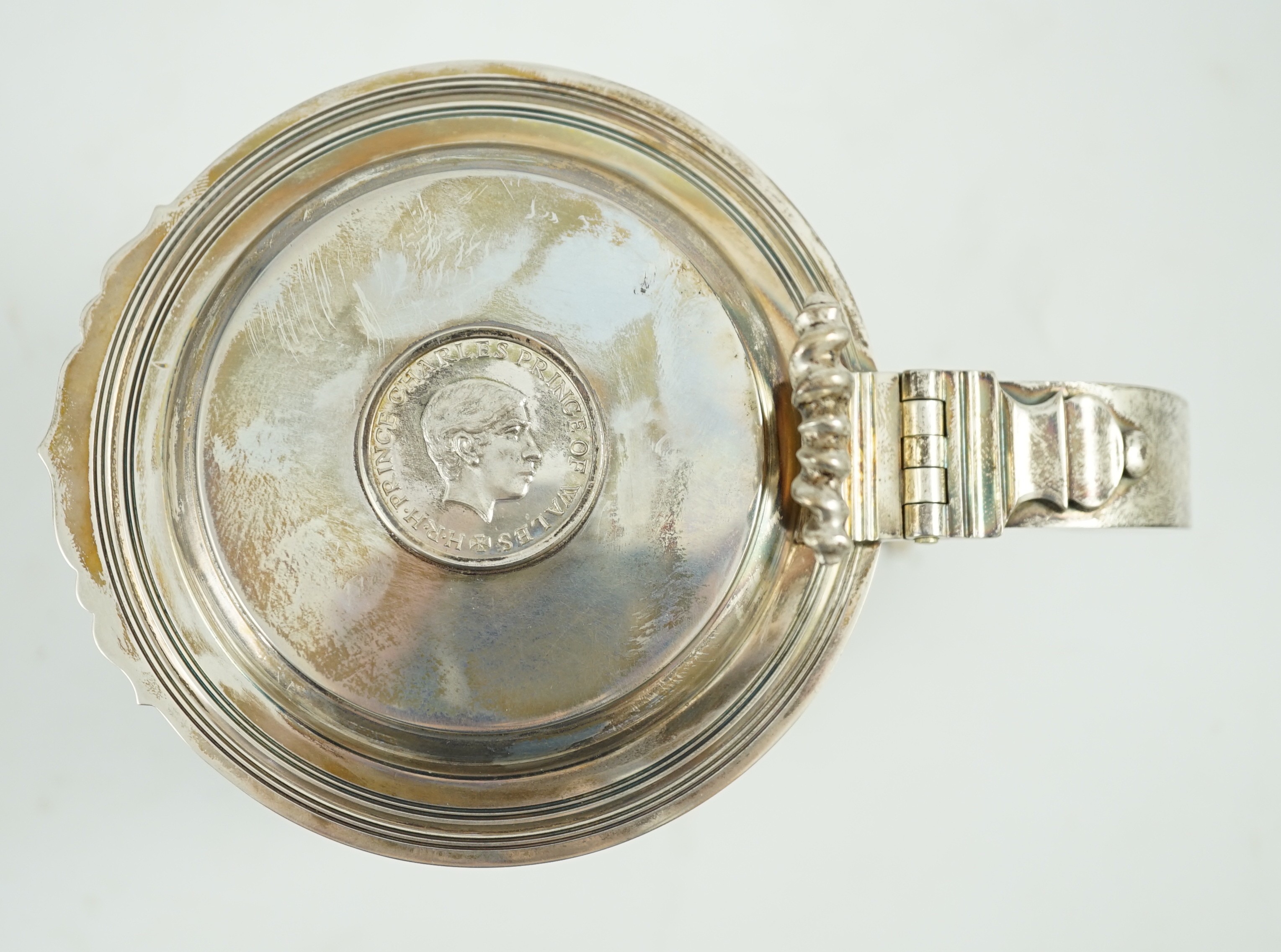 An Elizabeth II limited edition silver tankard, to commemorate the investiture of Charles as Prince of Wales at Caernarvon Castle, 1st July, 1969, Wakely & Wheeler, London, 1969